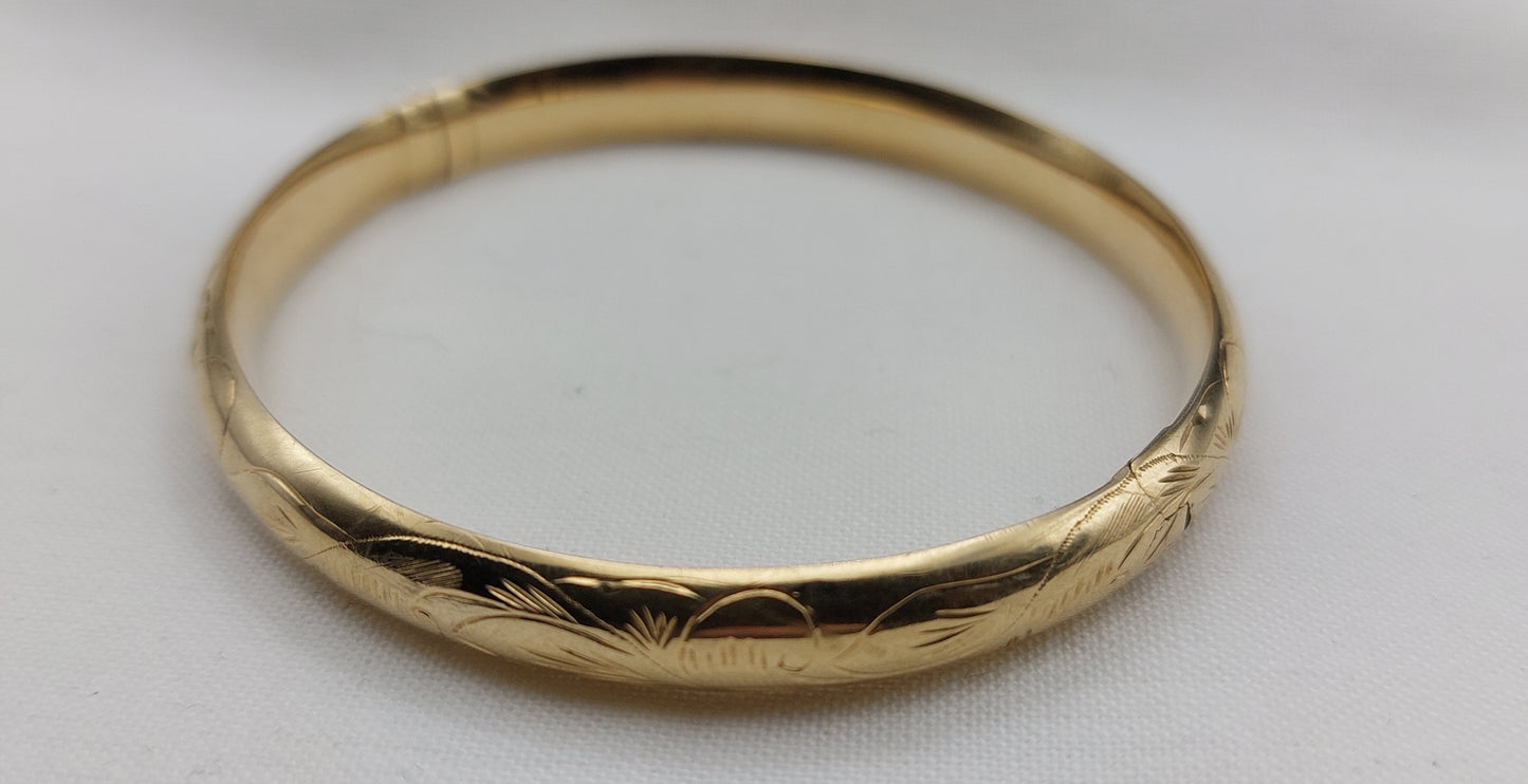 Vintage 14 karat oval armring med ciseleringer