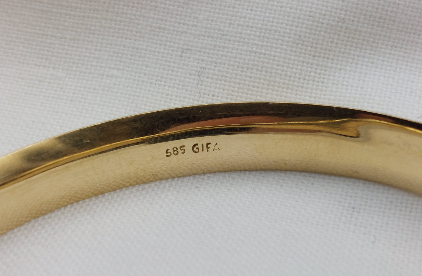 Vintage 14 karat oval armring med ciseleringer