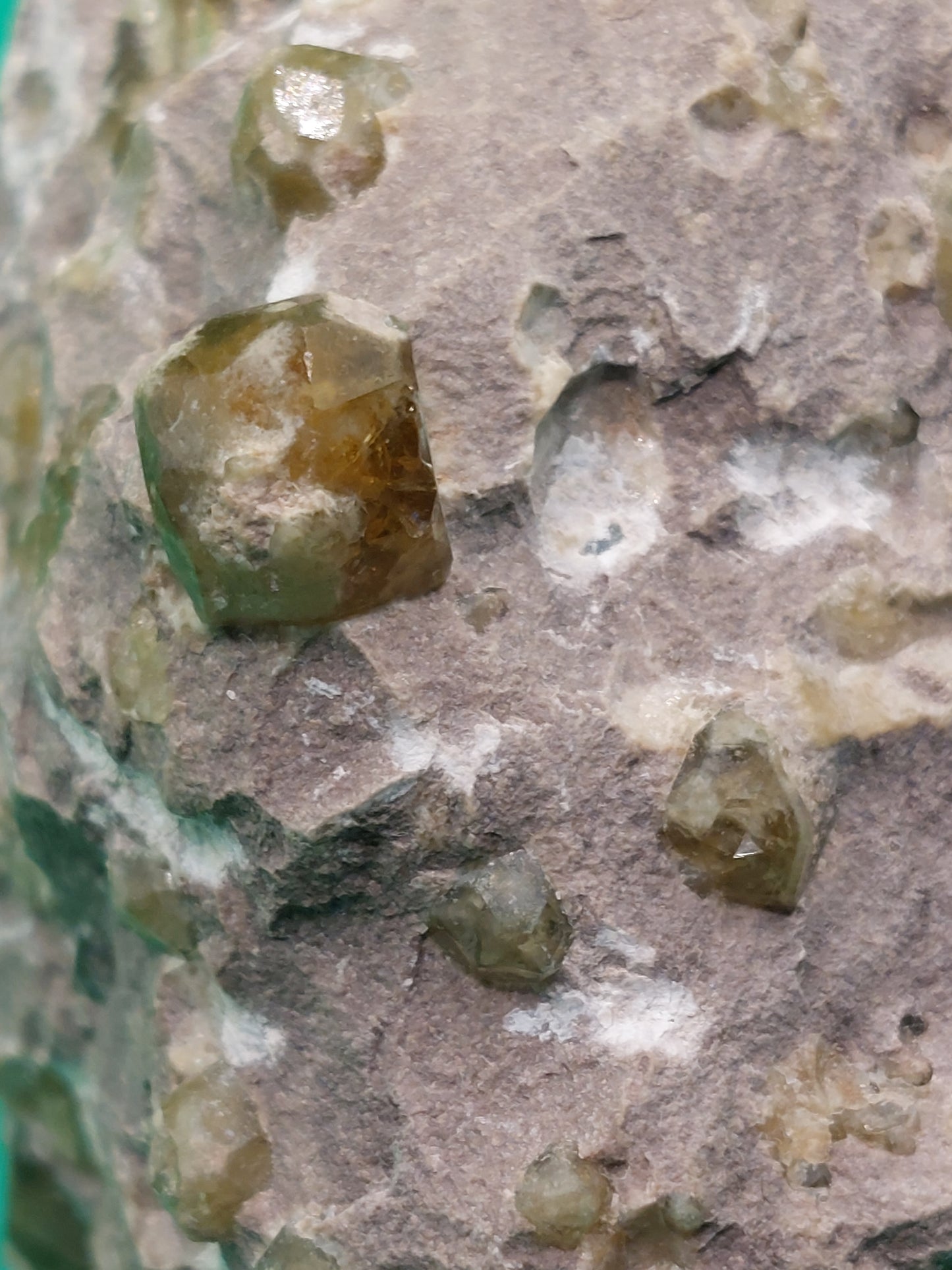 Green Grossular Garnet in matrix