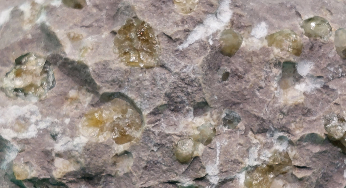 Green Grossular Garnet in matrix
