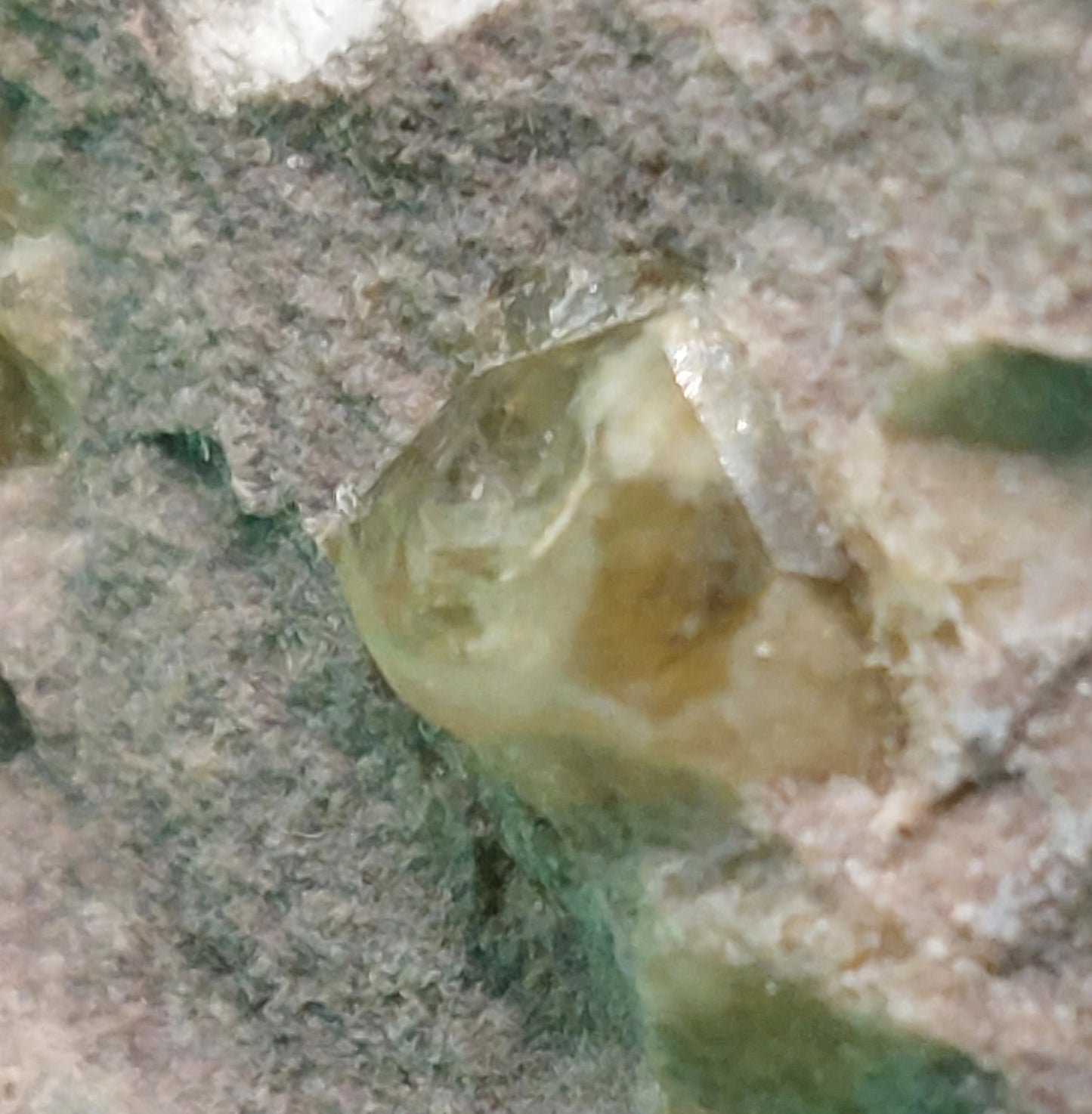 Green Grossular Garnet in matrix