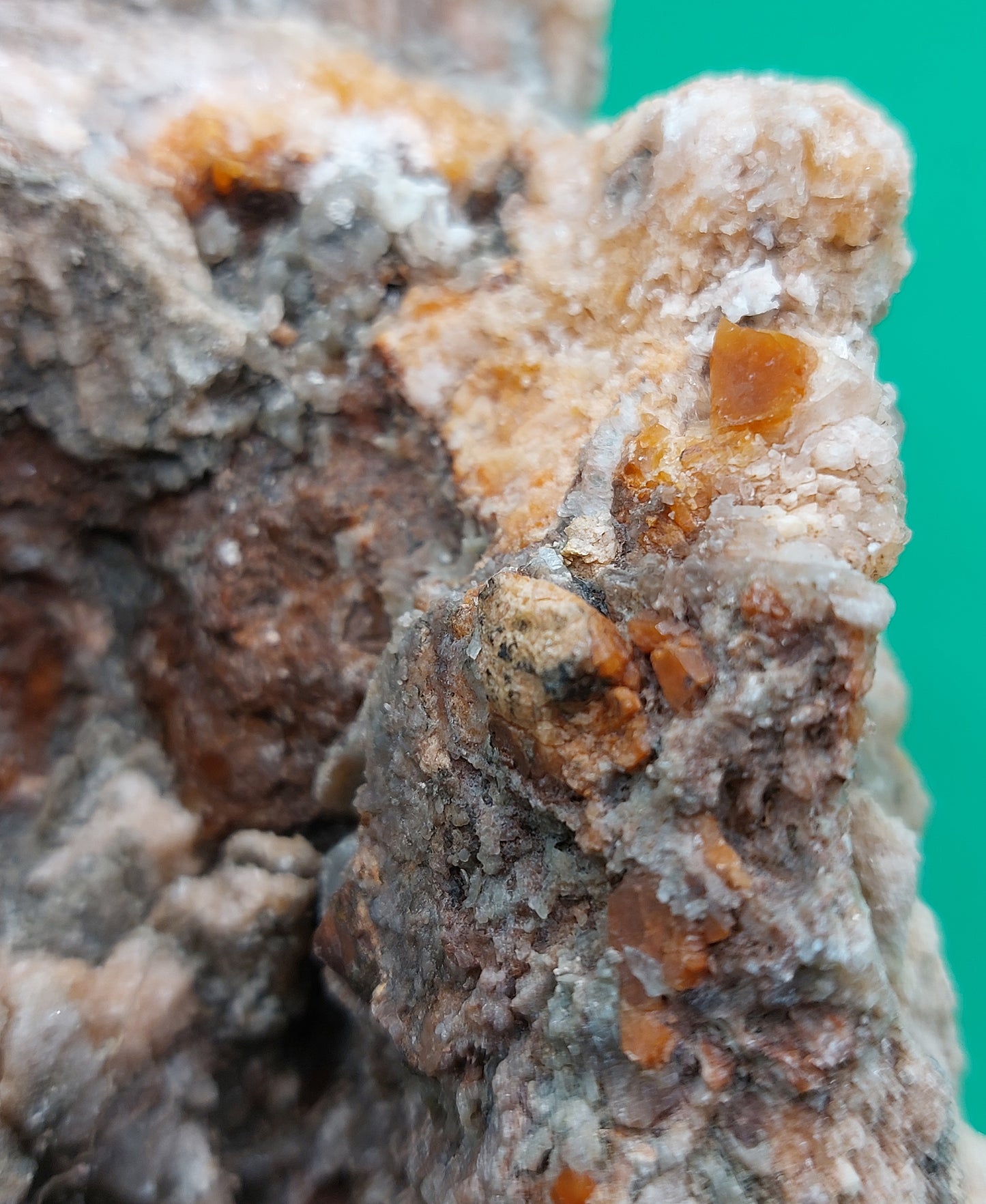 Gypsum with red/orange crystals