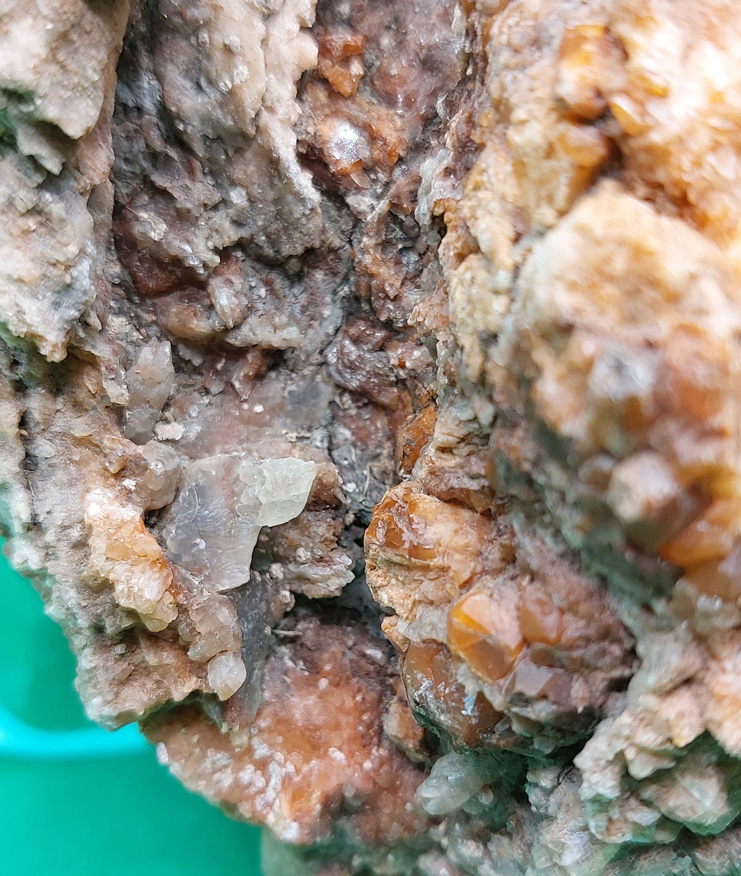 Gypsum with red/orange crystals