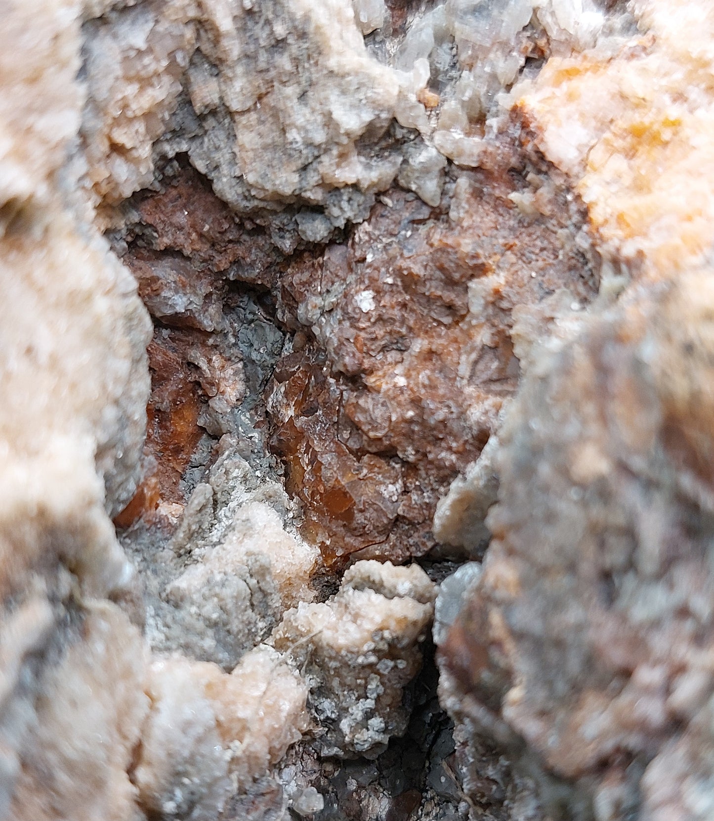 Gypsum with red/orange crystals
