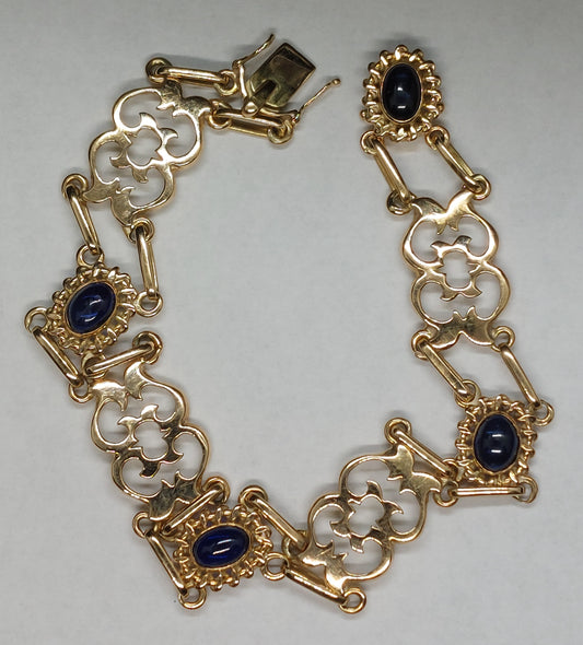 Vintage 14 karat guldarmbånd med 5 safirer