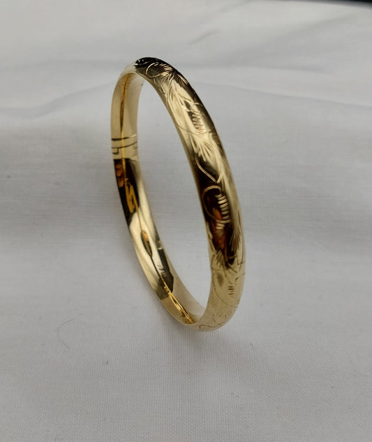 Vintage 14 karat oval armring med ciseleringer