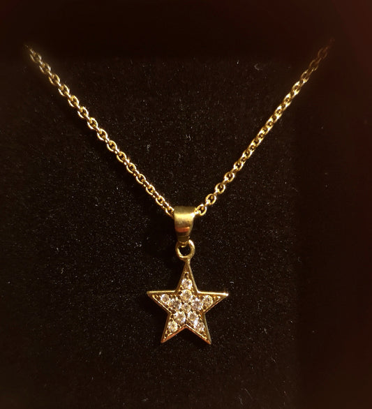 Guldstjerne med klare sten